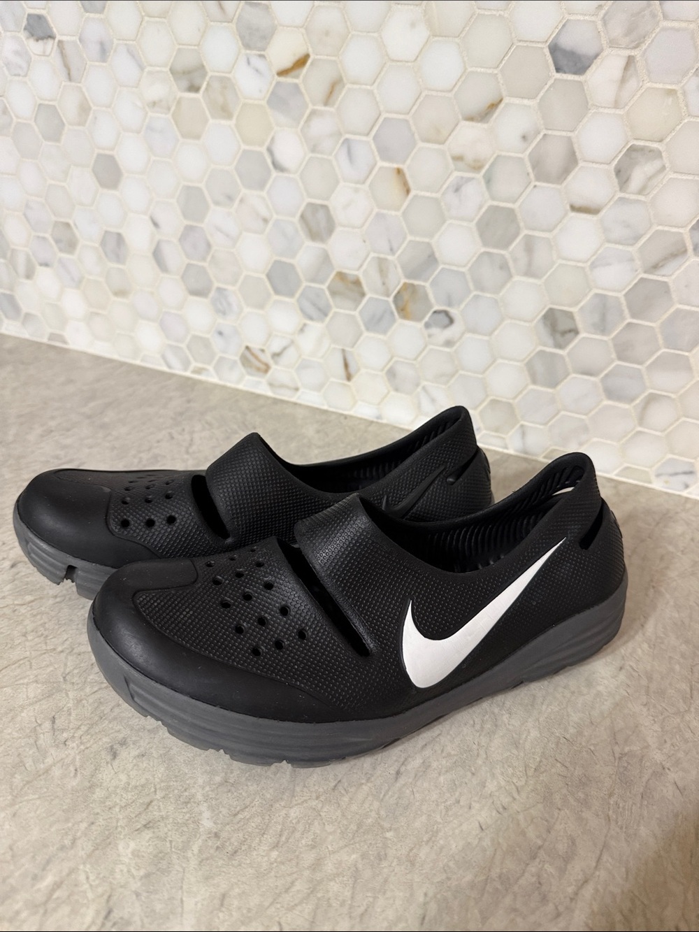 Nike Solar Soft Men's Black Slip-On Casual Shoes with White Swoosh